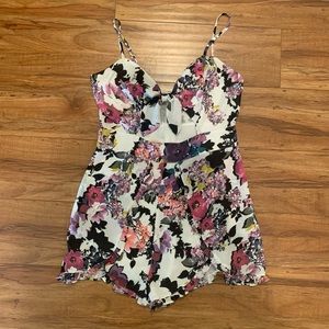 BEBE floral cut out romper